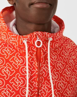 Blouson coupe-vent léger à capuche Mono rouge feu Storm monogram